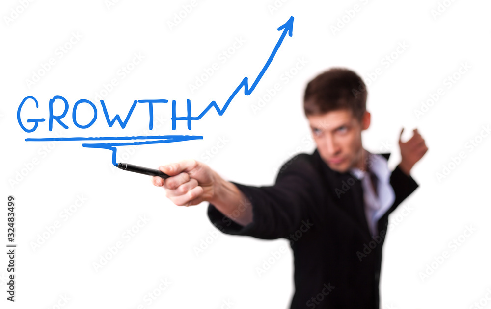 Businessman drawing a rising arrow, representing business growth Businessman drawing a rising arrow, representing business growth