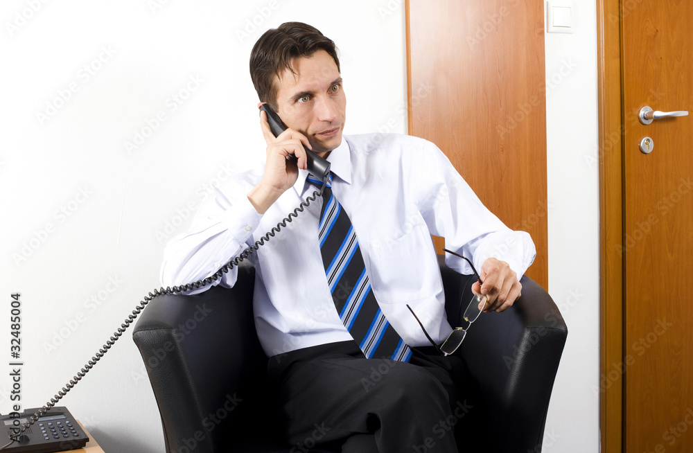 Young lawyer working in his office Young lawyer working in his office