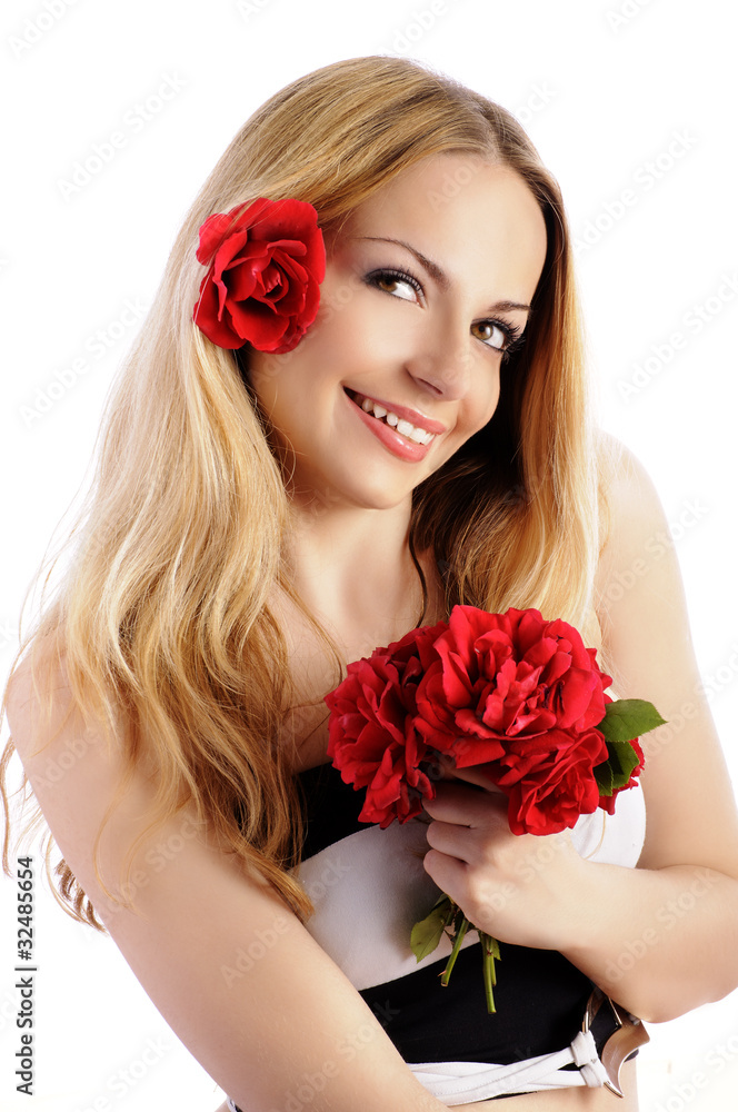 Pretty girl holding a bouquet of red roses Pretty girl holding a bouquet of red roses