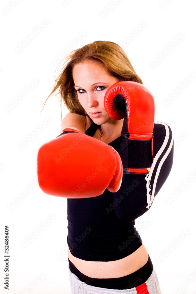 Attractive Caucasian girl practicing boxing Attractive Caucasian girl practicing boxing