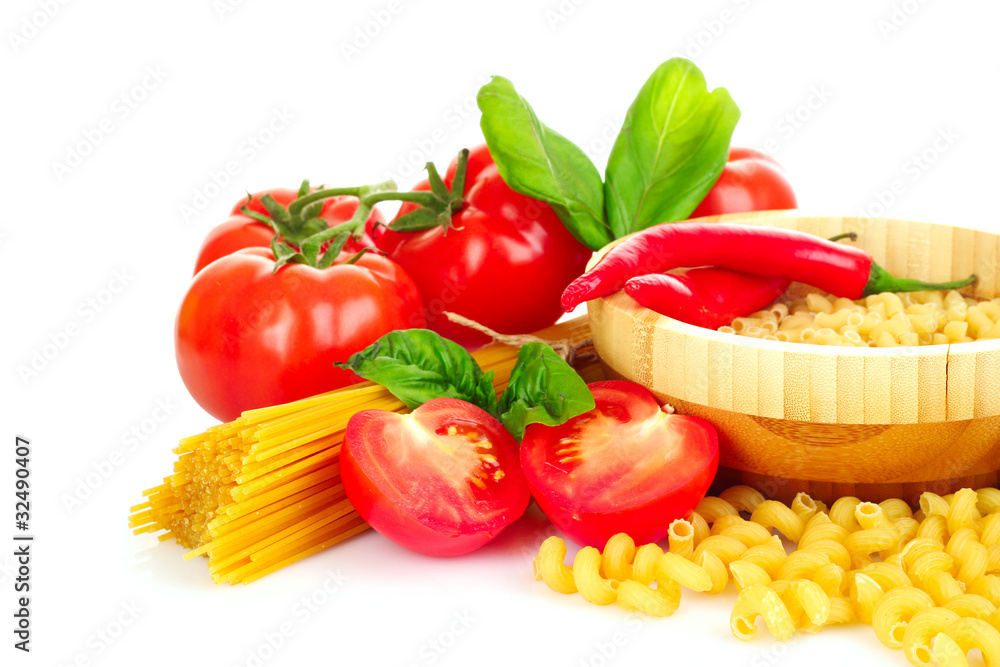 Pasta spaghetti with tomatoes, olive oil and basil on a white ba Pasta spaghetti with tomatoes, olive oil and basil on a white ba