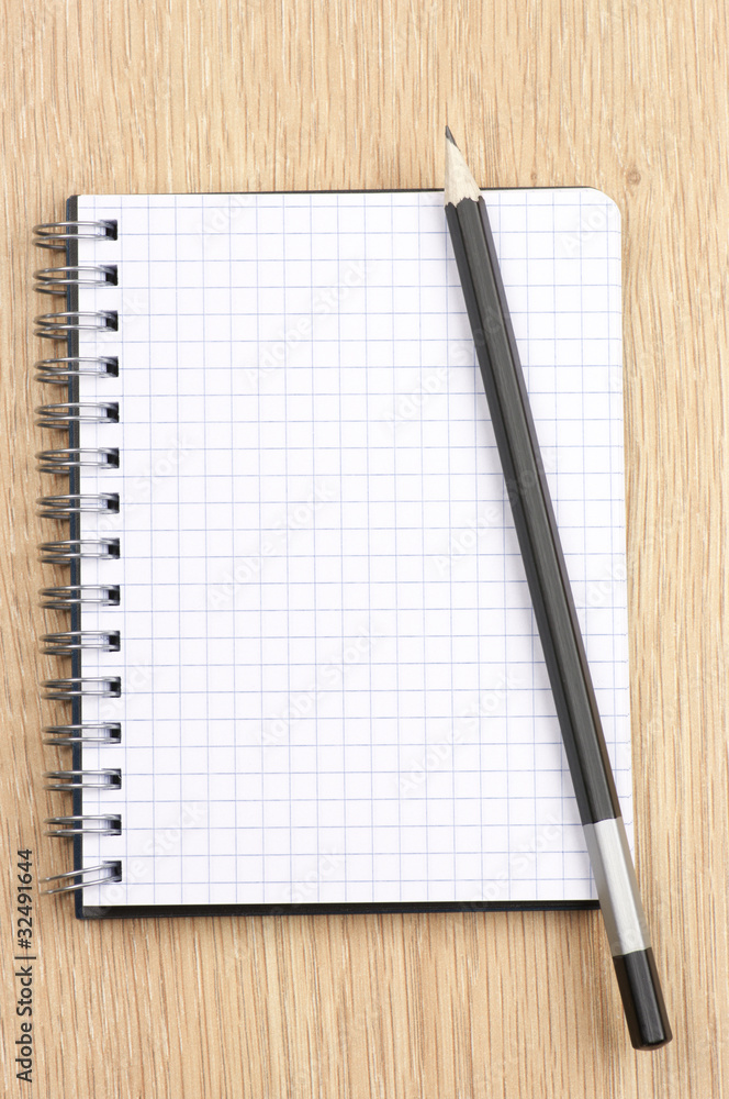 Notepad and pencil Notepad and pencil