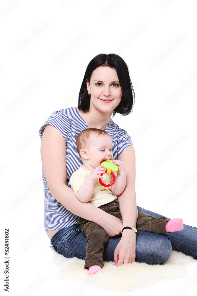 Fototapeta premium Mum holds on hands of the baby.