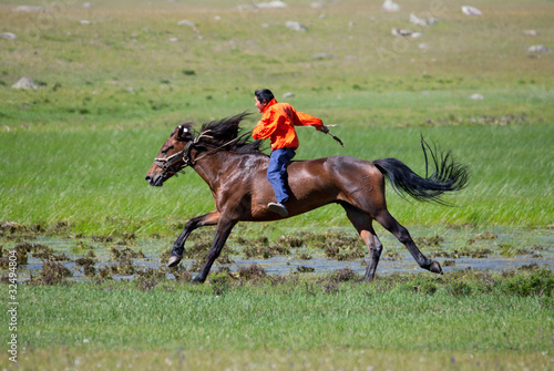 on horseback across the steppe © Hunta