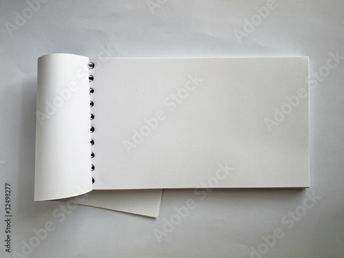 White Horizontal note book open photo