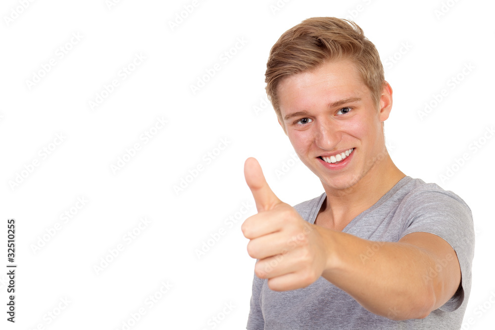 junger mann zeigt motivierend den daumen hoch junger mann zeigt motivierend den daumen hoch