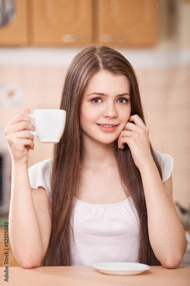 beautiful happy young woman drinking coffee at home beautiful happy young woman drinking coffee at home