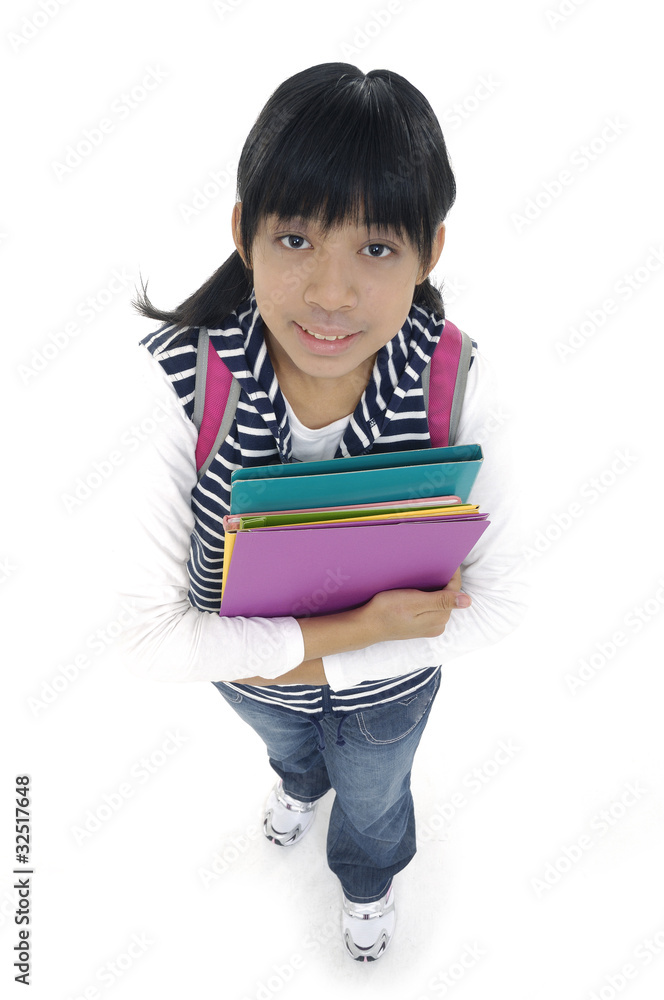 adorable girl with backpack holding a book adorable girl with backpack holding a book