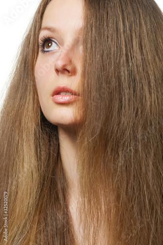 The beautiful girl with long healthy hair