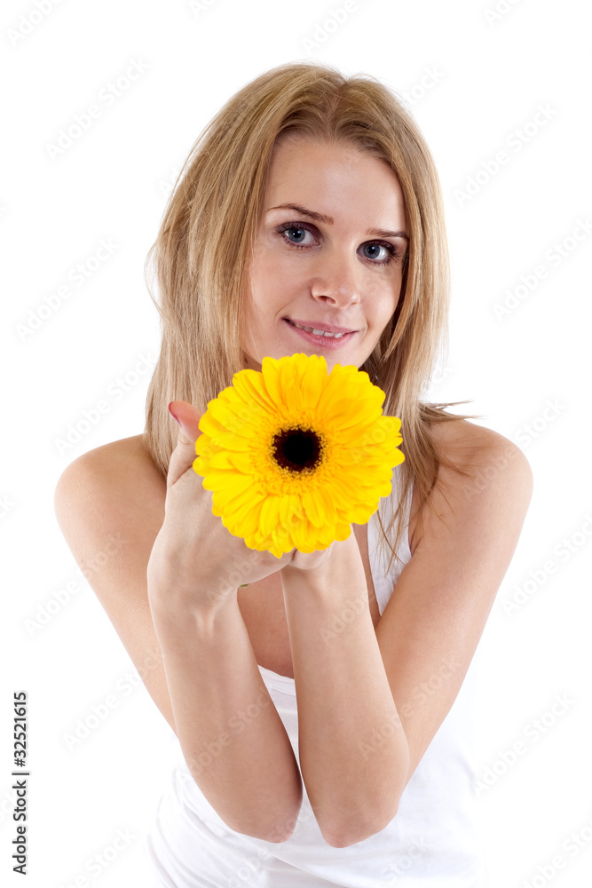 pretty young woman holding a  flower