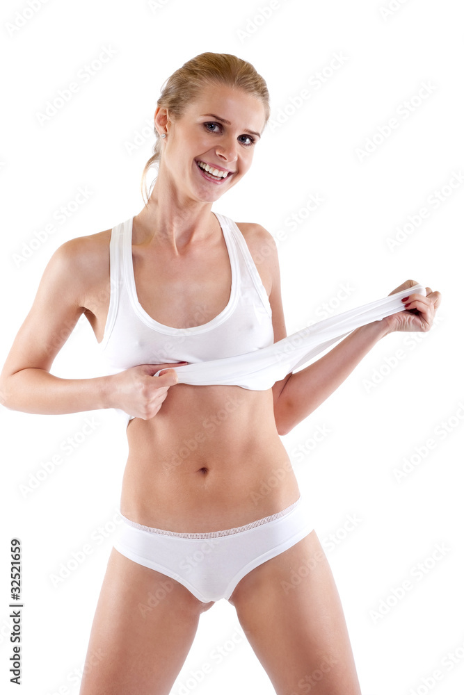 Fototapeta premium Healthy woman pulling her shirt