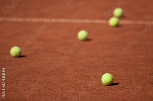 Tennis balls on the court © lightpoet