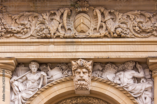 Stone carving on building exterior in Bristol UK