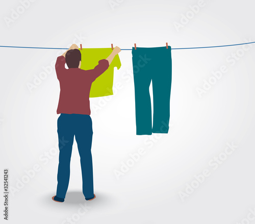 Silhouette d'un homme étendant le linge
