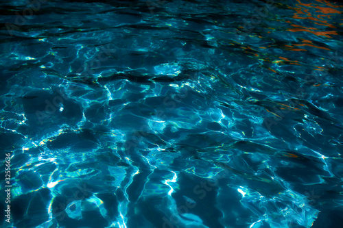 Waves in night pool