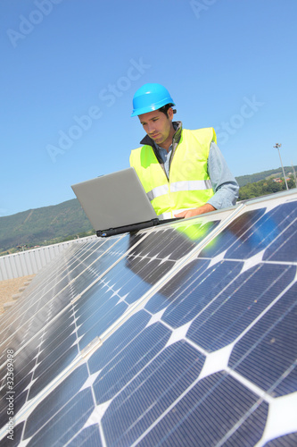 Engineer checking photovoltaic installation