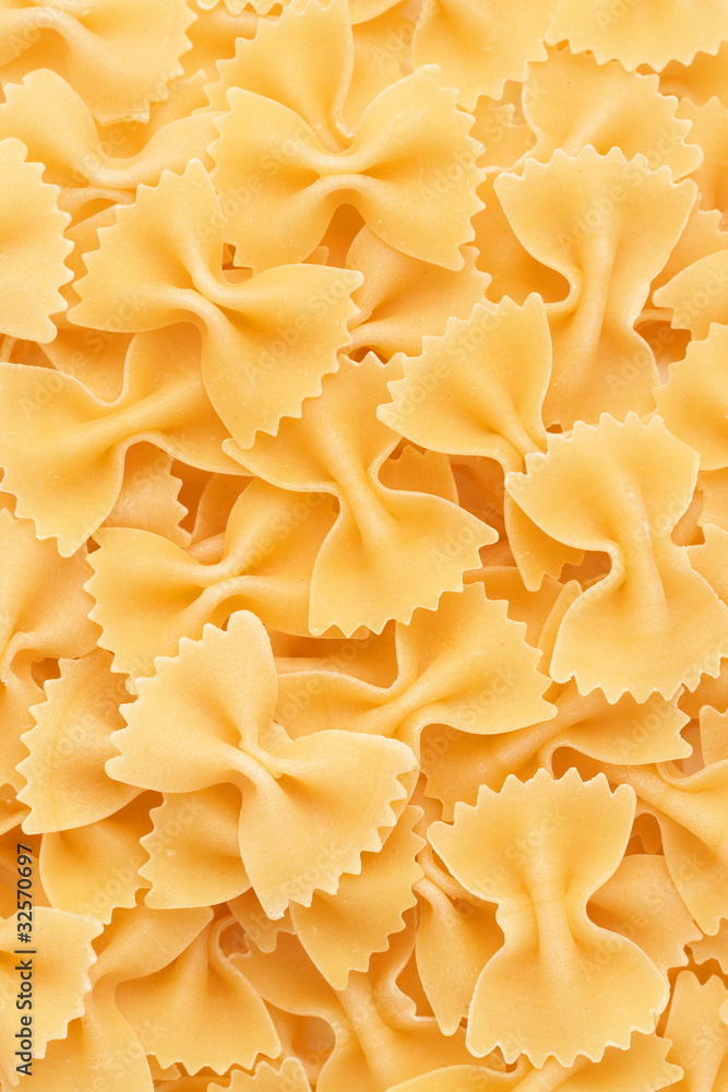 Bow tie pasta forming a background Bow tie pasta forming a background