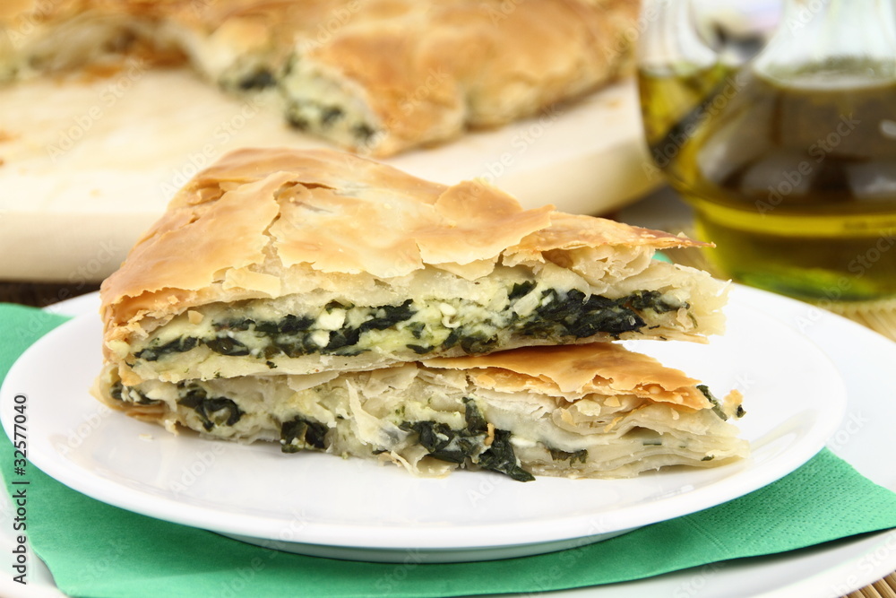 Homemade puff spinach pie with filo pastry Homemade puff spinach pie with filo pastry