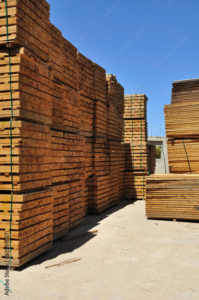 Wood rails in warehouse territory.