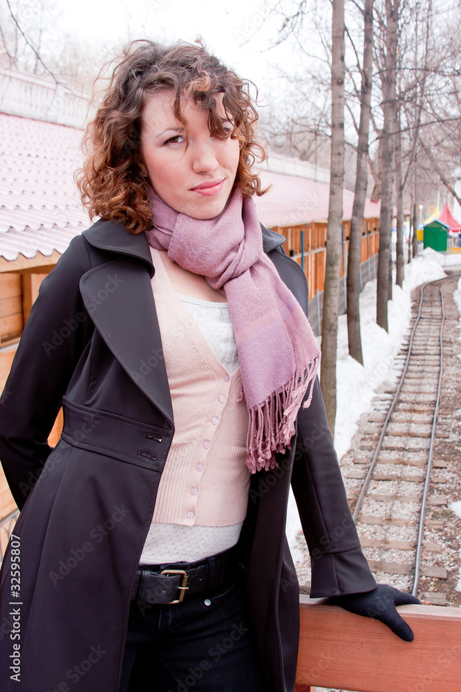 beautiful woman on a background a railway beautiful woman on a background a railway
