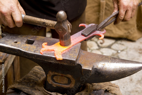 Canvas Print blacksmith forged iron smith anvil hammerman
