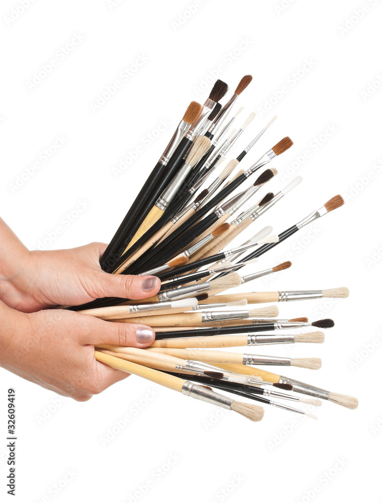 Fototapeta premium Brushes in hand