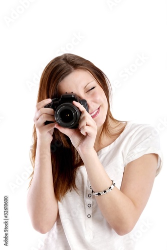 young woman with single-lens reflex camera (white background)