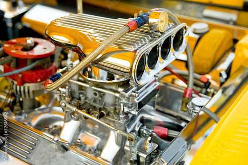 powerful race vehicle engine and blower closeup photo