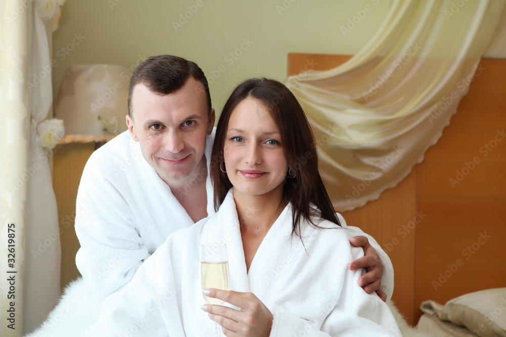 young couple with glasses of champagne young couple with glasses of champagne