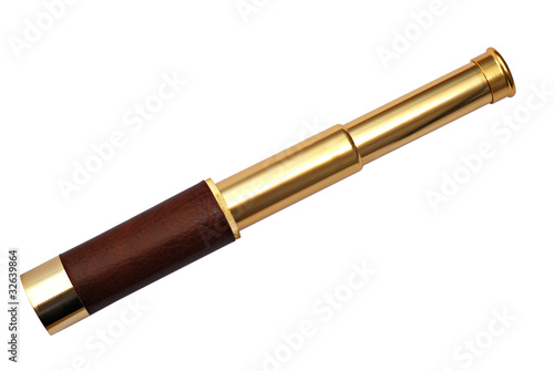 Brass telescope isolated over white
