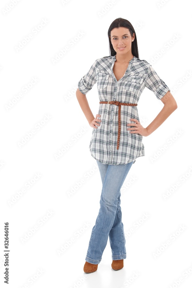 Pretty girl in jeans and shirt smiling Pretty girl in jeans and shirt smiling