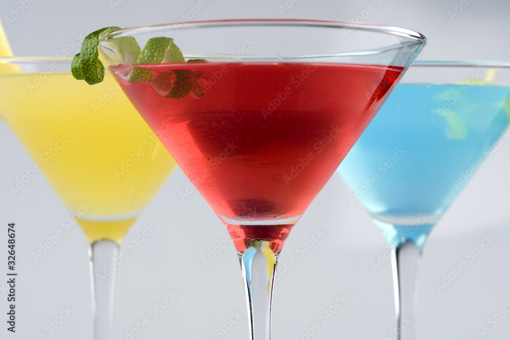 Tropical Martini Drinks with fruit and garnish