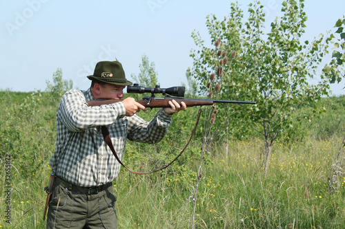 hunter aiming and ready for shot