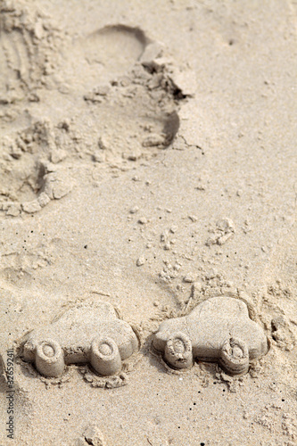 Car figure in sand