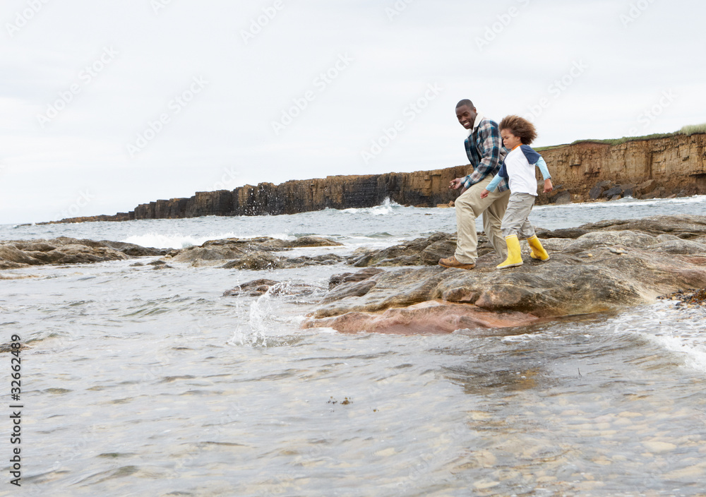 Obraz premium Father and son on beach