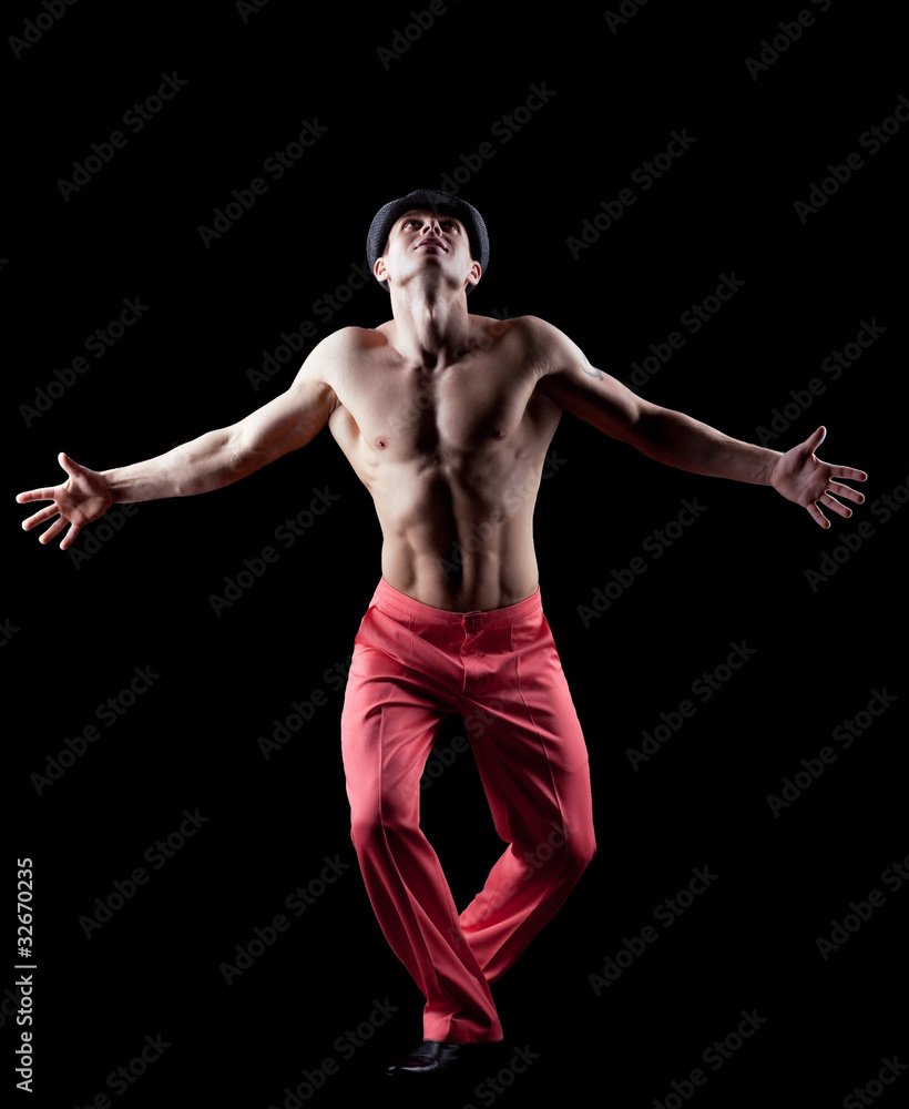 Obraz premium young naked man dance striptease in red costume