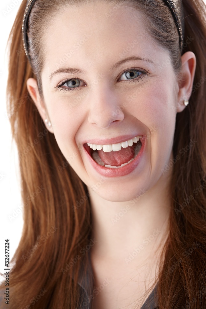 Closeup portrait of smiling young gingerish woman Closeup portrait of smiling young gingerish woman