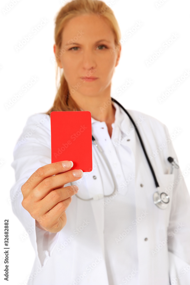Ärztin zeigt rote Karte