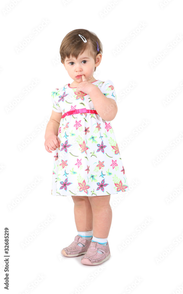 little girl in a light summer dress. little girl in a light summer dress.