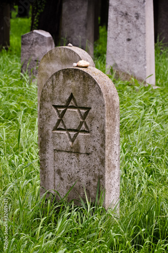 lone headstone on a jewish cemetary