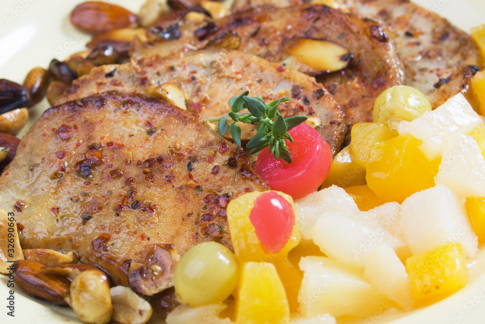 Caribbean style pork shops with tropical fruit Caribbean style pork shops with tropical fruit