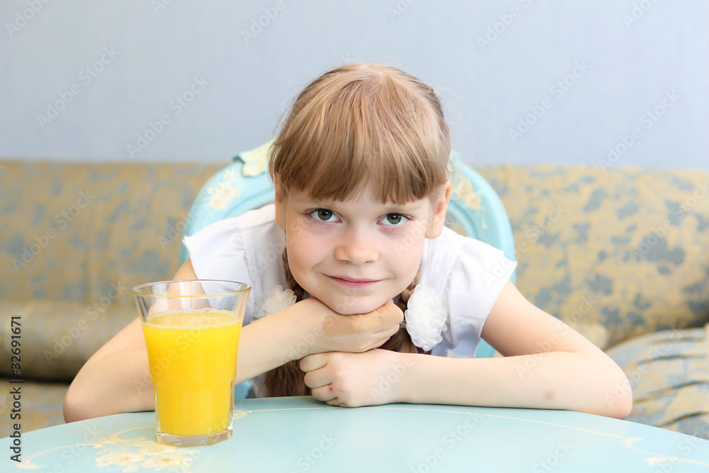 portrait of little girl with orange juice portrait of little girl with orange juice