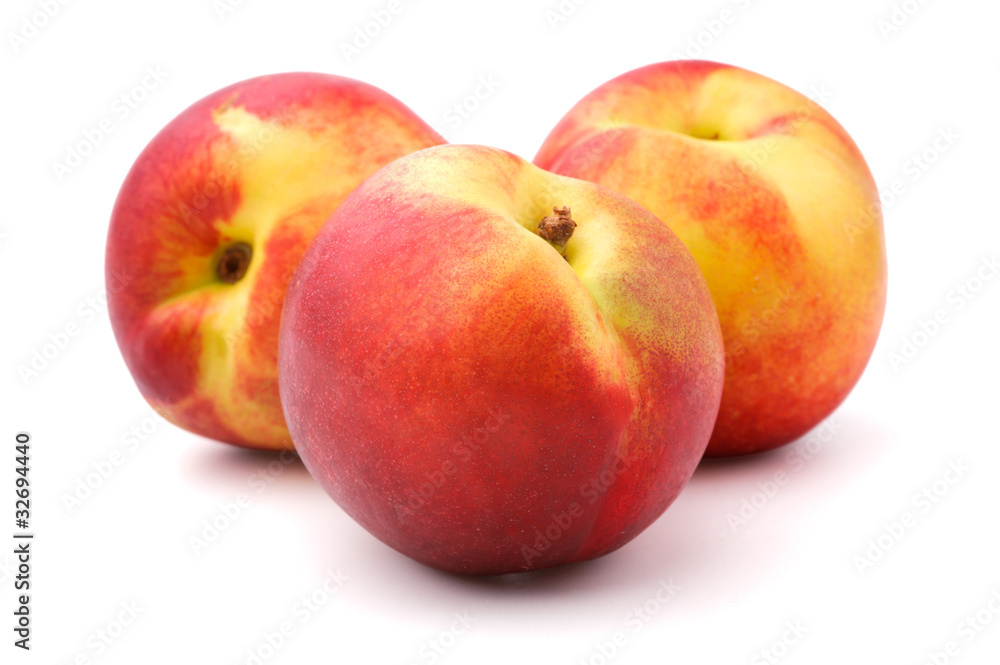 Three nectarines, isolated, white background Three nectarines, isolated, white background