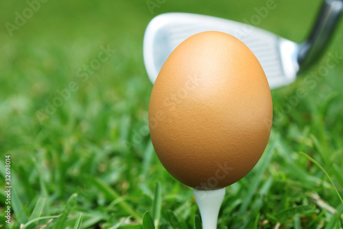 Fotografie palo de golf con un huevo