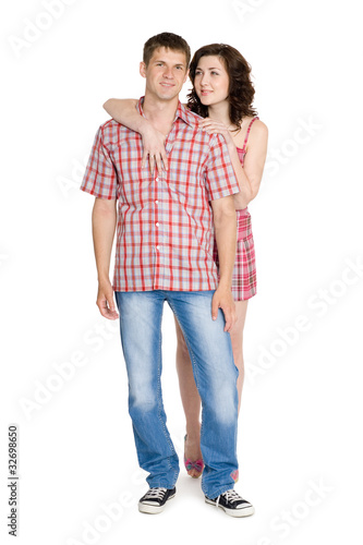 Happy young embracing couple