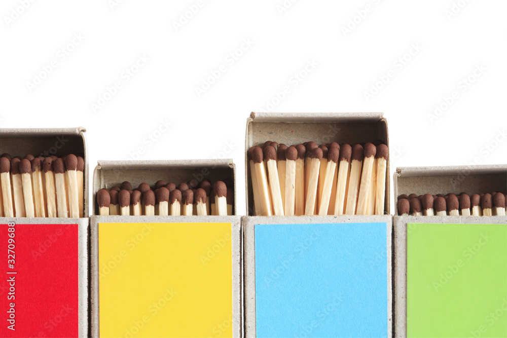 Fototapeta premium Motley Matchboxes On White