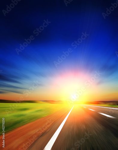 Blurred Road with blurred sky with sunset