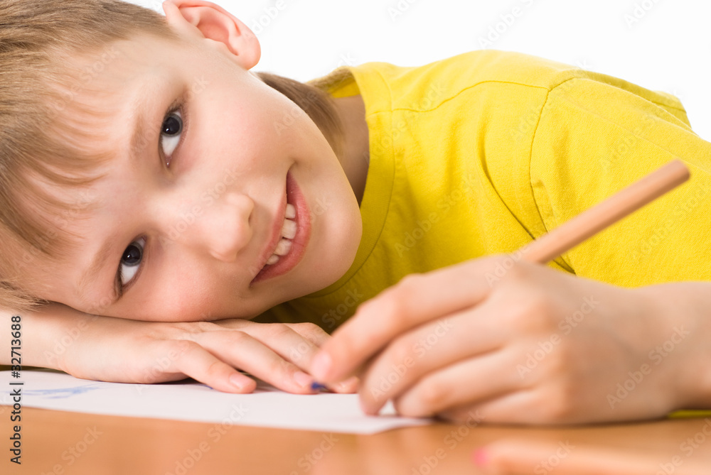 young boy at the table