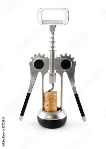 silver corkscrew with cork from wine isolated on white