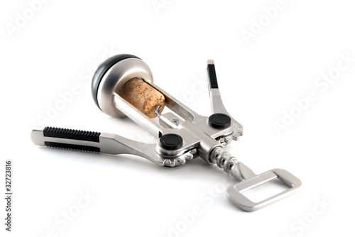 corkscrew with cork from wine isolated over white